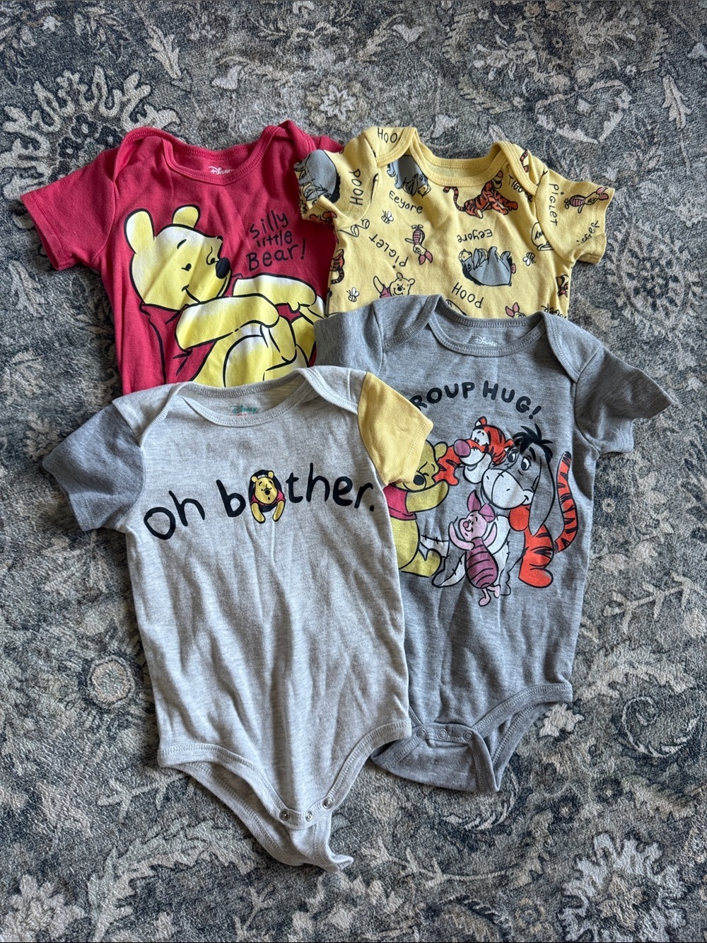 Bundle of 4 Winnie the Pooh Onesies